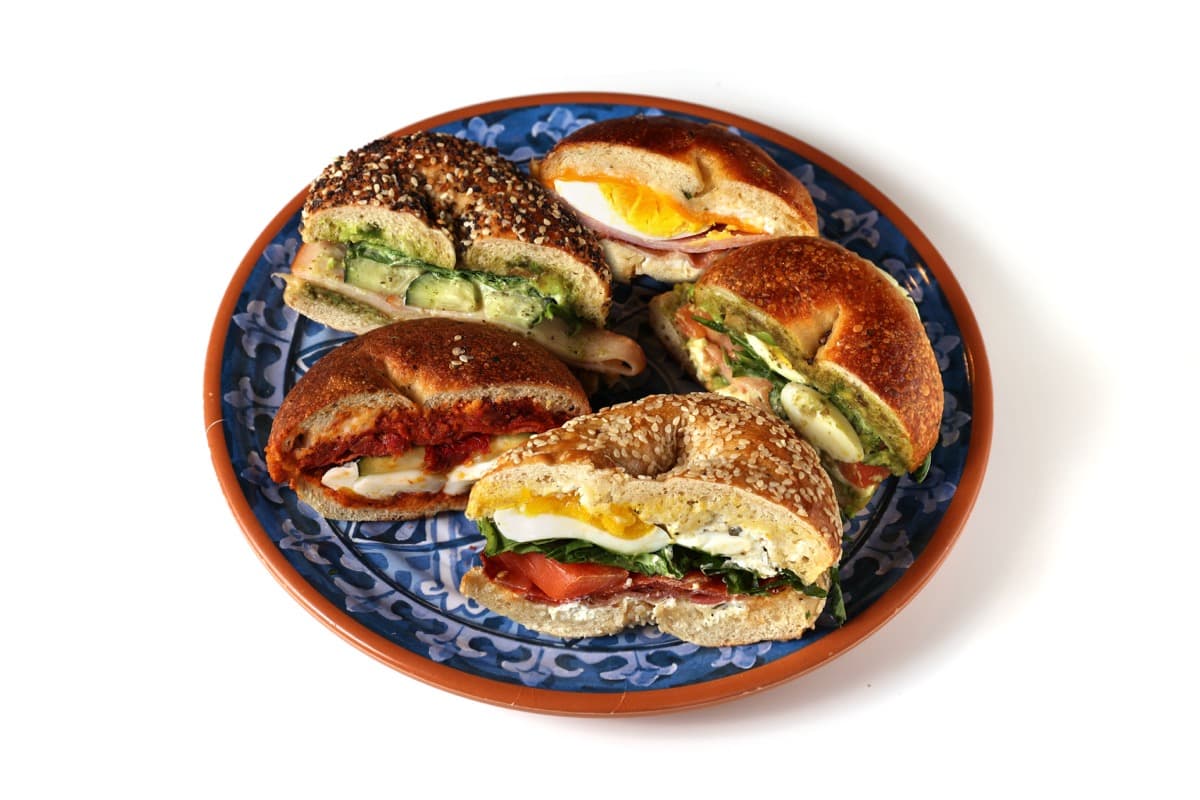 Assorted bagel sandwiches on Mediterranean plate